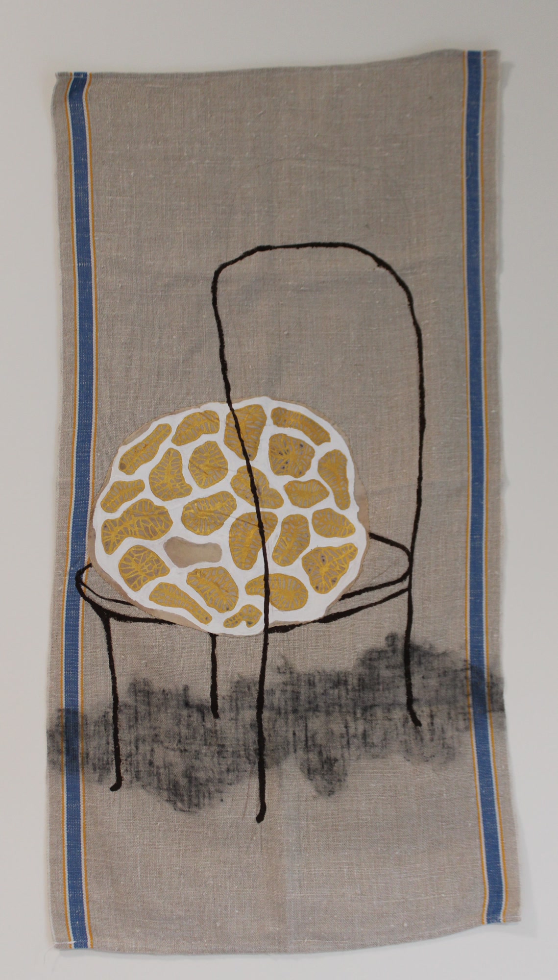 Mixed-media textile piece, The Burden You Carry, showing an upright chair motif across eco-printed linen in warm taupe, charcoal lines, and sewn botanical patches.