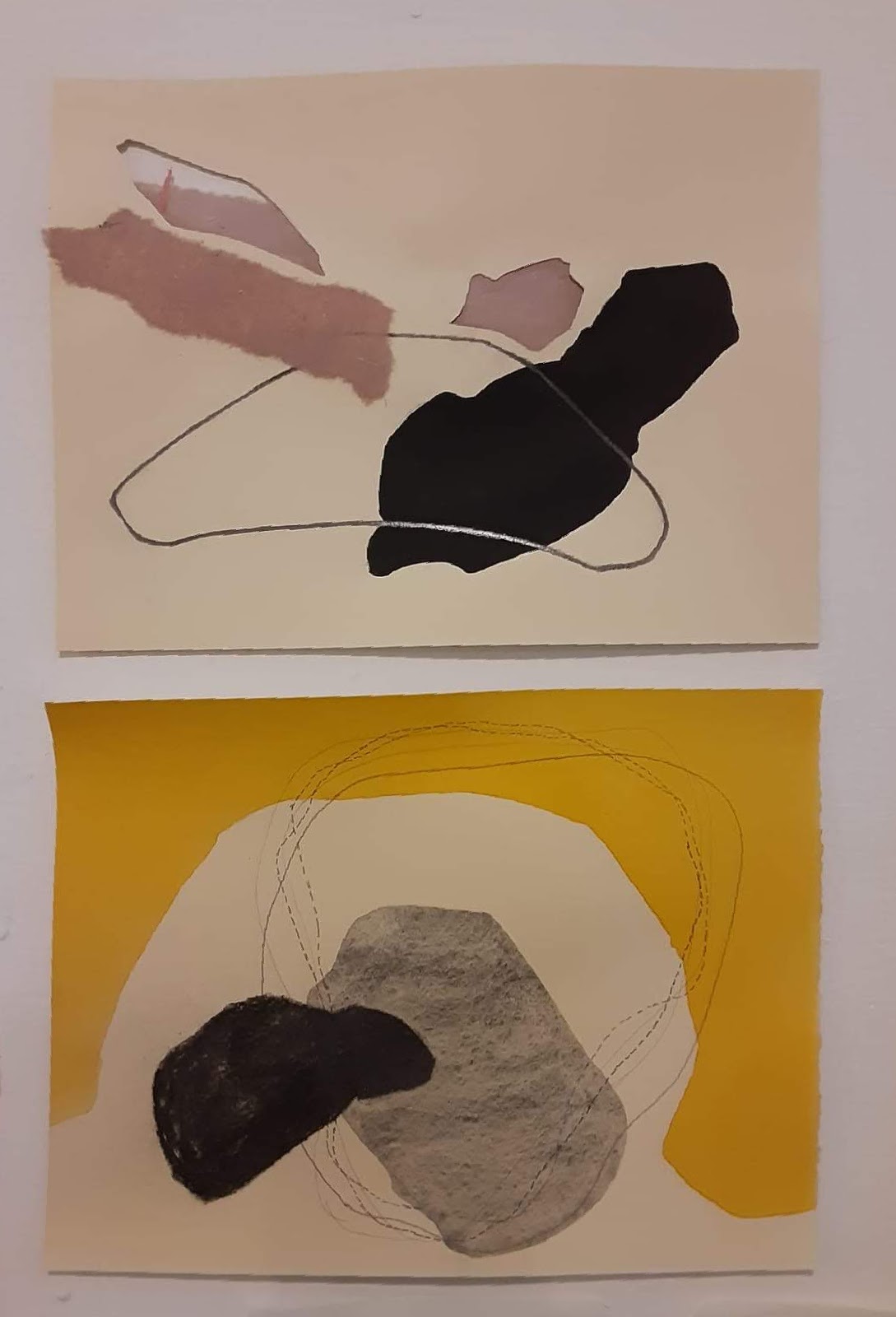 Drawing on paper exploring overlapping translucent tones and lines.